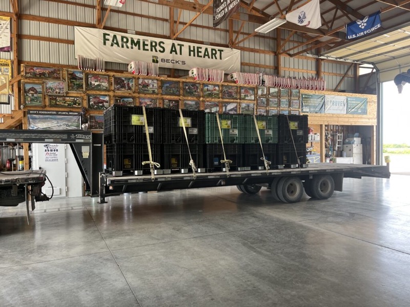 Beck’s seed boxes loaded on a flatbed trailer in the warehouse