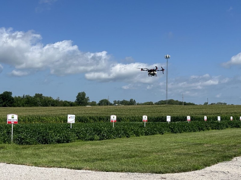 A drone flying over Beck’s seed test plots