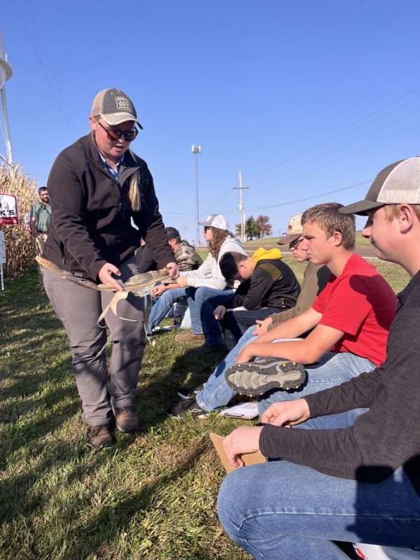 A hands-on soil demonstration at a field day