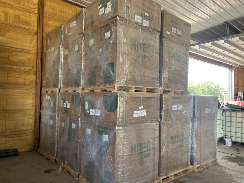 Pallets of farm supplies stored in the warehouse